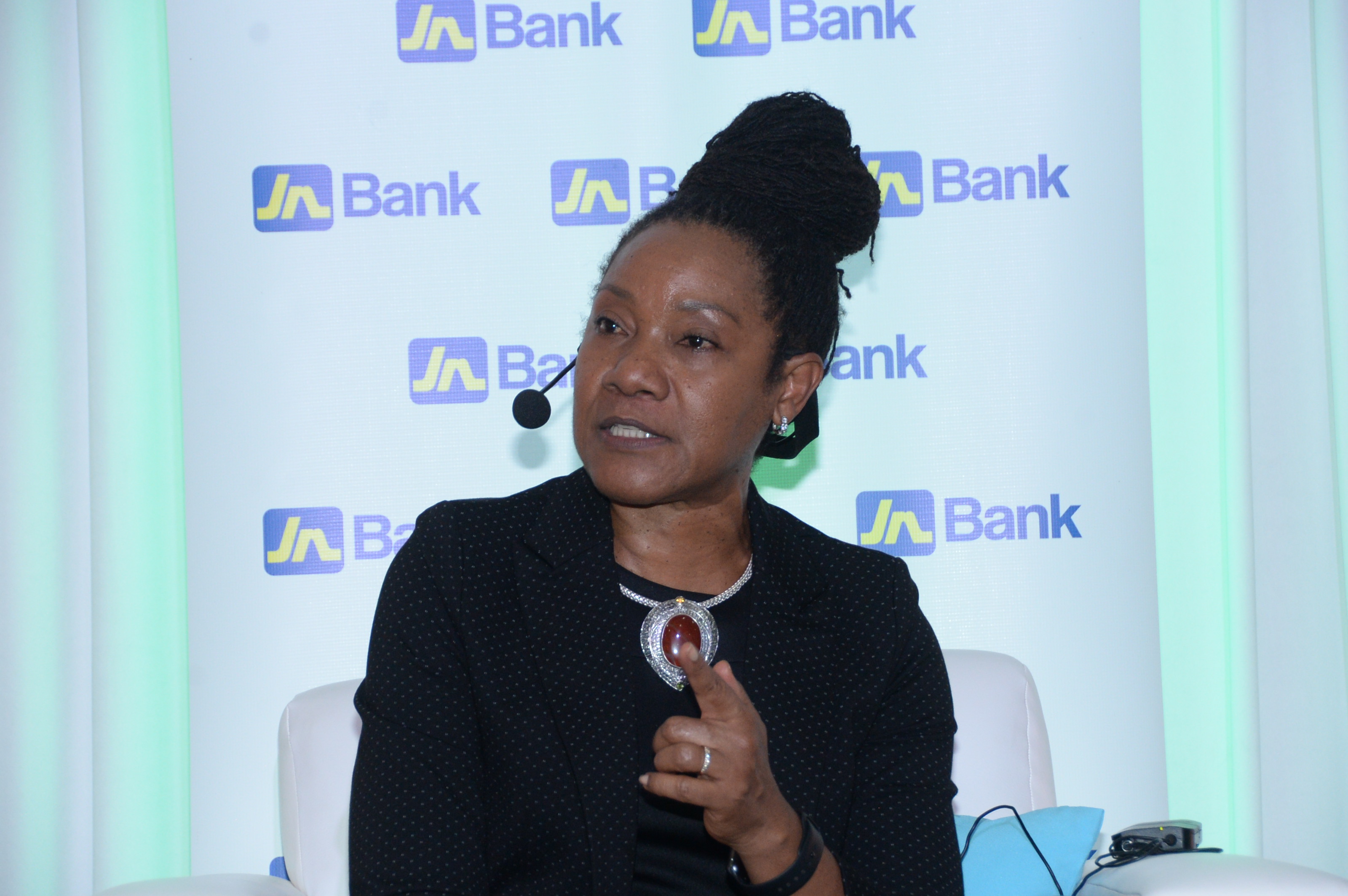 Rose Bennett-Cooper, chair of the Rent Assessment Board, addresses the audience at the ‘Know Your Property Rights’ symposium, mounted by the Realtors Association of Jamaica (RAJ), held at the Golf View Hotel in Mandeville recently. The event, sponsored by JN Bank, provided residents along the south coast with pertinent information about the land titling process.