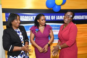 Sandra Jones (left), Manager, Public Sector Engagement, JN Bank; Marlene Murray-Brown (centre), Acting Centre Manager and Counsellor, Womenโs Centre of Jamaica Foundation (WCJF); and Novlette Howell, Executive Director, WCJF, share a light discussion. The occasion was the graduation ceremony at the WCJF in St Andrew on July 2 for 13 adolescent mothers. Mrs Jones brought greetings on behalf of JN Bank at the event.