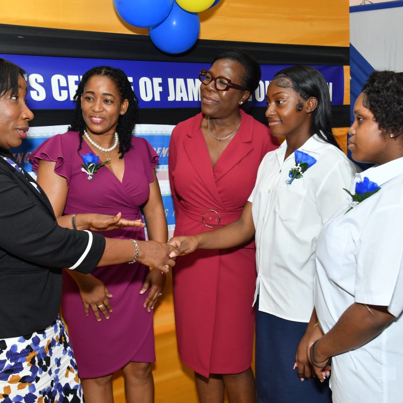 Sandra Jones (left), Manager, Public Sector Engagement, JN Bank, congratulates Nyalia Cookkorne (second right) and Treshanna Thompson (right) on their outstanding academic performance. The occasion was the graduation ceremony for 13 adolescent mothers at the Women’s Centre of Jamaica in St Andrew on July 2. Sharing in the special moment are Marlene Murray-Brown, Acting Centre Manager and Counsellor, WCJF; and Novlette Howell, Executive Director, WCJF.